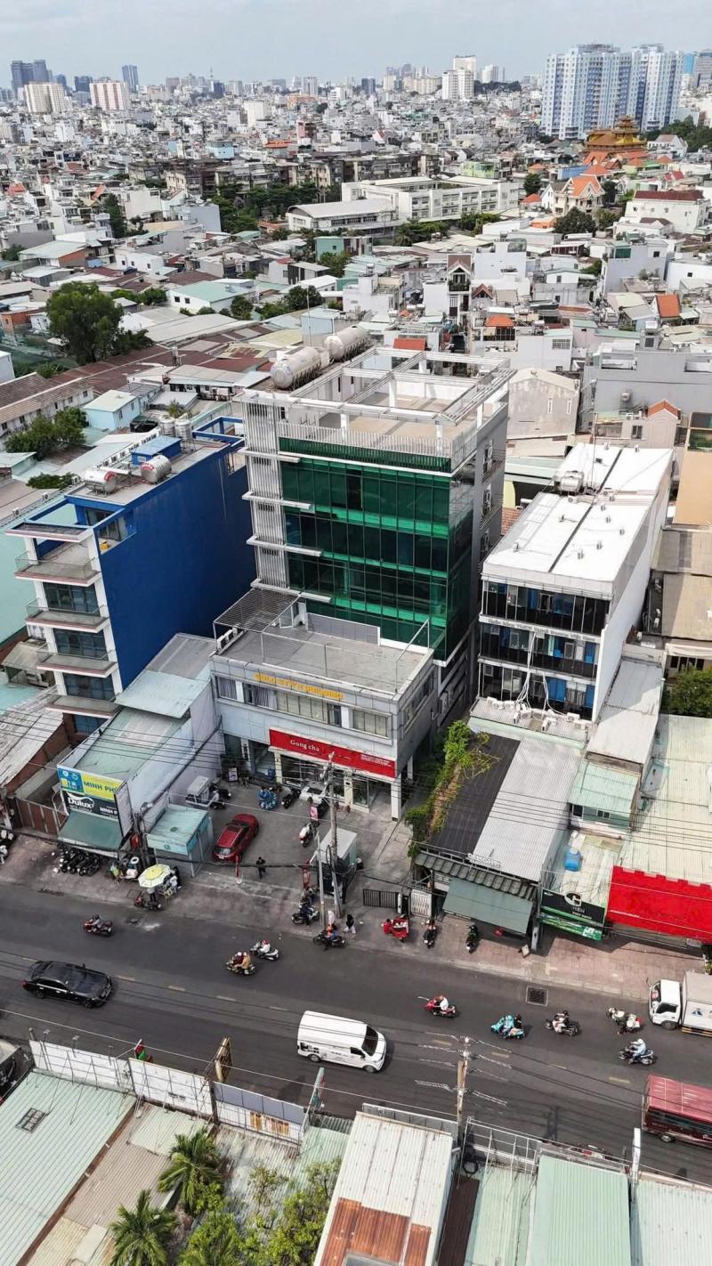 Bán tòa nhà MT đường Nguyễn Xí DT: 17,4x50m (NH 20m) 1 building 6 tầng + 1villa