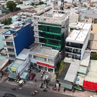Bán tòa nhà MT đường Nguyễn Xí DT: 17,4x50m (NH 20m) 1 building 6 tầng + 1villa